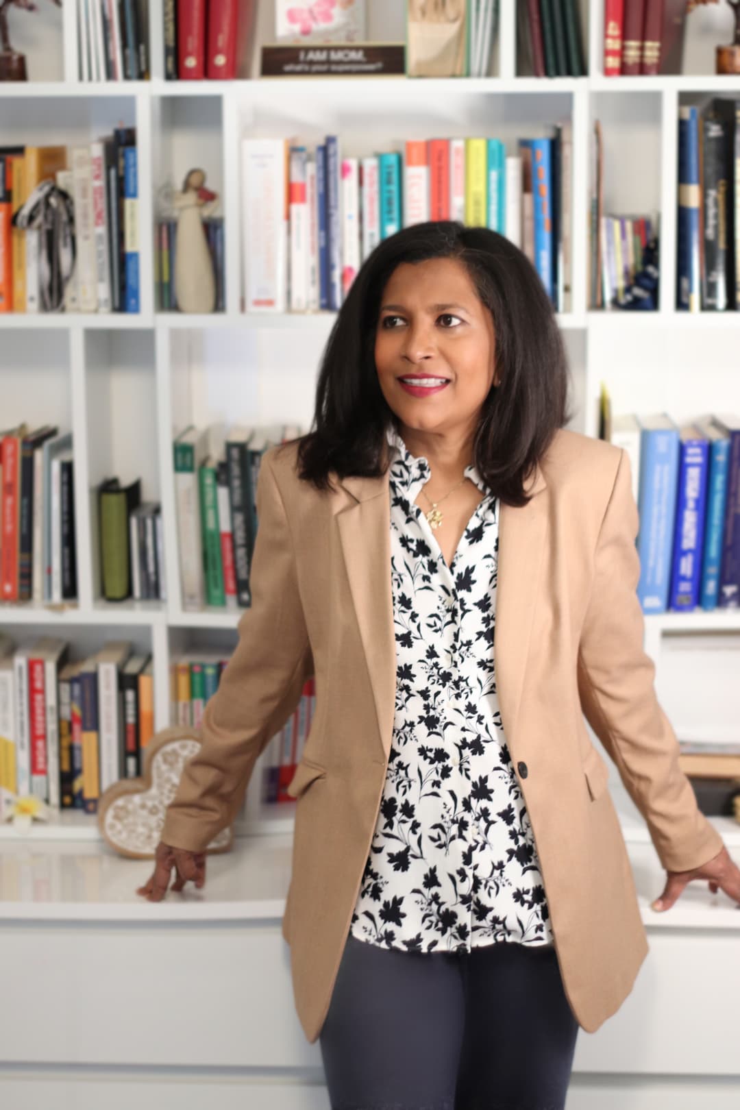 Dr. Gomes standing in her office